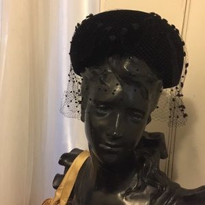 Chic vintage velvet pillbox hat with netting